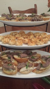 Artichoke Dip in Phyllos Cups Steak Canapes on Garlic Toasts with Roquefort Cream and Caramelized Pears & Onions